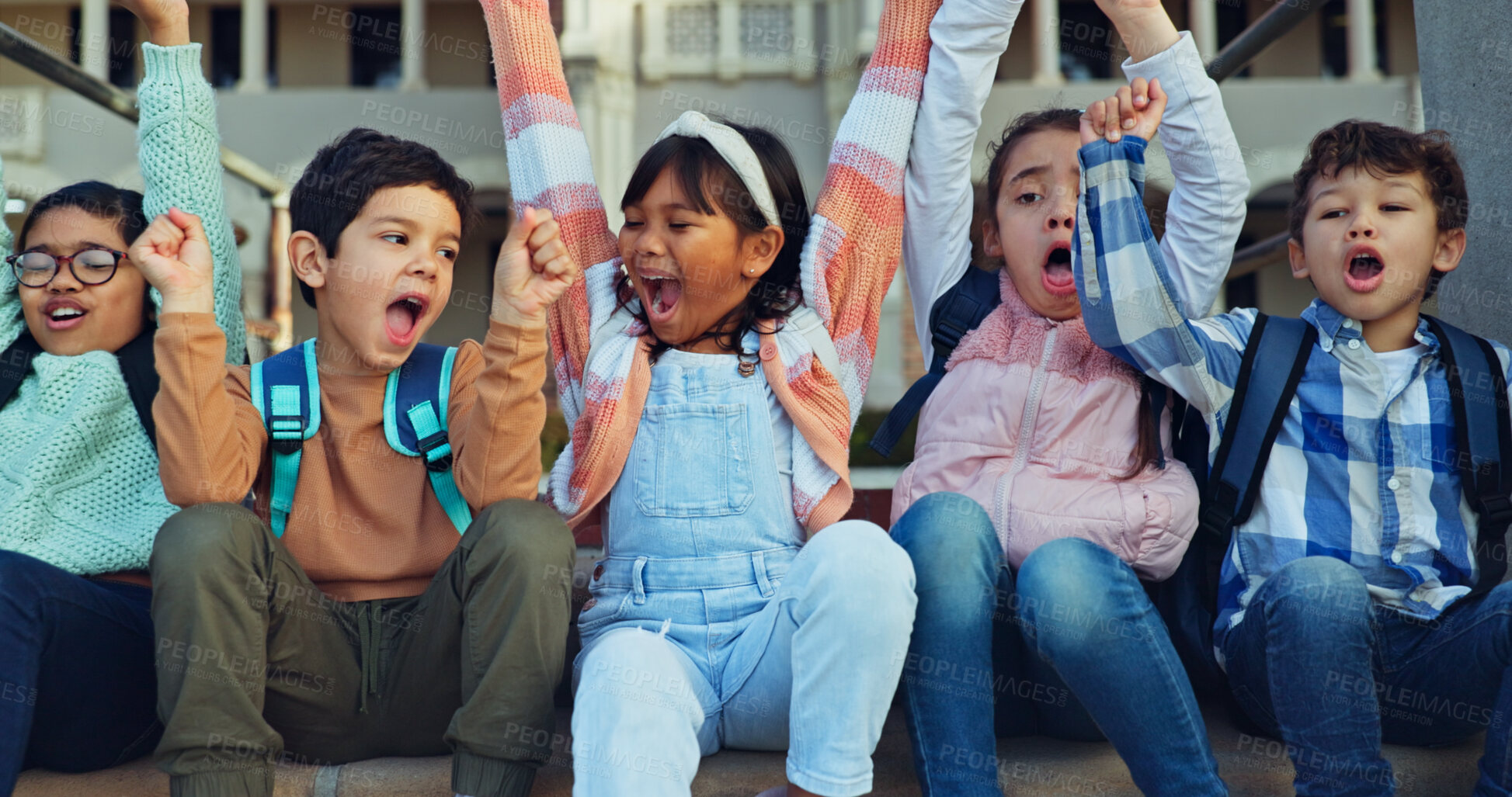 Buy stock photo Children, group and celebration on stairs at school with hands up, cheers or excited to start learning. Kids, friends and happy with screaming, diversity or together on steps for education at academy