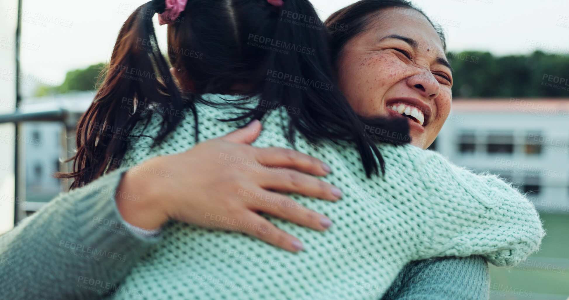 Buy stock photo Hug, mother and girl with education, outdoor and smile with support, kindness and happiness. outside, family and single parent with kid, daughter and childhood with embrace, cheerful and joyful