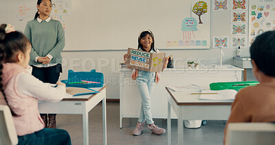 Buy stock photo Happy girl, classroom or presentation with poster for recycling, global warming or awareness on waste at school. Young, child or elementary student with sign for lesson on pollution or climate change