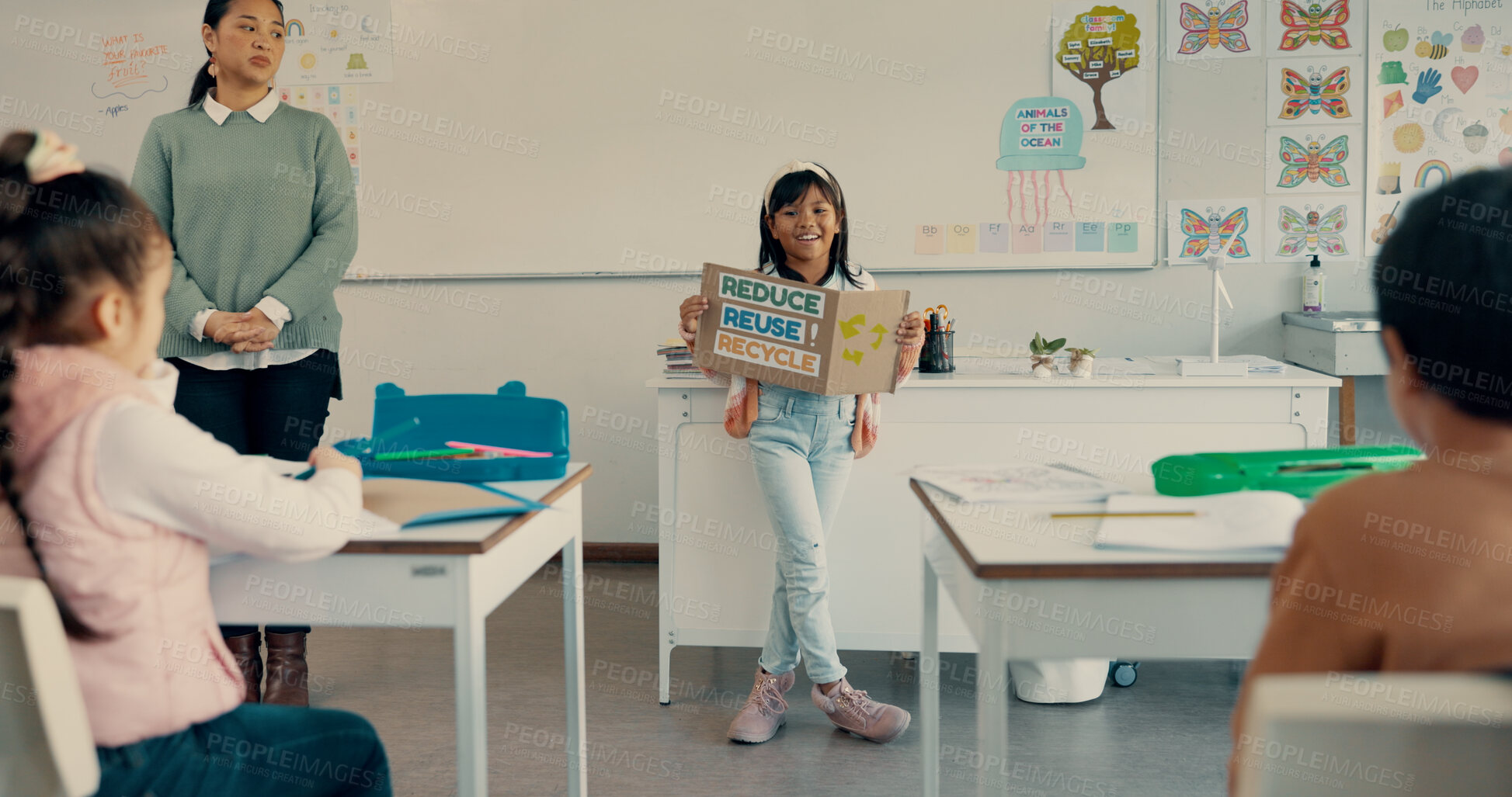 Buy stock photo Happy girl, classroom or presentation with poster for recycling, global warming or awareness on waste at school. Young, child or elementary student with sign for lesson on pollution or climate change