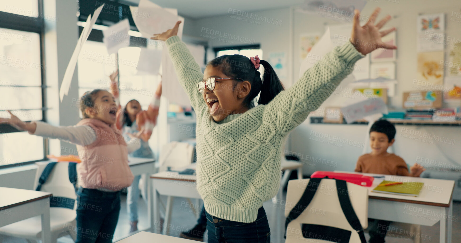 Buy stock photo Excited children, students and celebration with documents in air for holiday, summer or end of school semester. Young, happy and elementary kids with smile for recess, done or finished in classroom