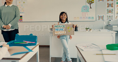 Buy stock photo School, student and presentation with poster in classroom for eco friendly project, recycling lesson and public speaking. Girl, kid or oral speech for environmental conservation, teaching or learning