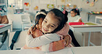 Hug, friends and education with children in classroom for bonding, support and learning. Team, school project and knowledge with students at academy for achievement, lesson progress and studying
