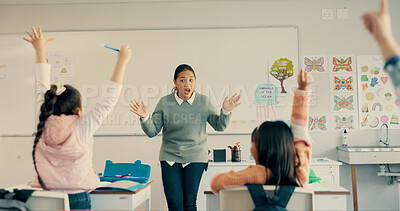 Buy stock photo Teacher, children and surprise for raised hand in classroom with question, learning and education at academy. Woman, school kids and wow for solution, game and quiz with teaching for scholarship