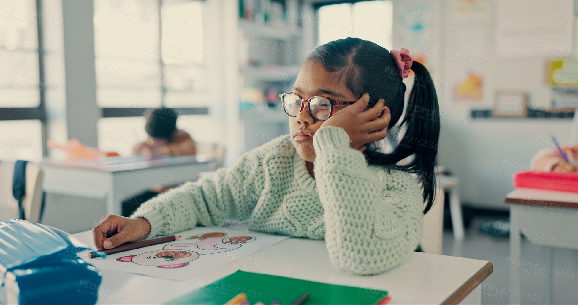 Buy stock photo Girl, child and bored with thinking in classroom for drawing, color or art with fatigue at academy. Kid, lazy and tired with  sketch, bear and burnout for education, development or creative at school