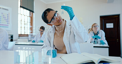 Buy stock photo Woman, student and scientist with tube for experiment, chemical compound or exam in classroom or science. Young, female person or biologist with vials for sample, assessment or test in laboratory