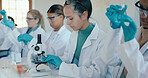 University, teamwork and students with microscope for science, education and practical experiment. laboratory, female person and biology with sample for test, examine and study research in college