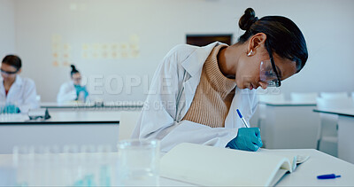 Buy stock photo Science, student and writing in class for learning, PPE and lecture for higher education. Chemistry lesson, girl or notes in academy for experiment, lab research and studying for exams with testing