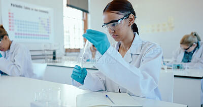 Buy stock photo Woman, student and scientist with tube for experiment, chemical compound or exam in classroom. Young, female person or biologist with dropper or pipette for sample, assessment or test in laboratory