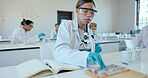 High school, girl and microscope in science classroom for chemistry analysis, sample study and practical lesson. Student, notes and learning of medical research for experiment with ppe safety in lab