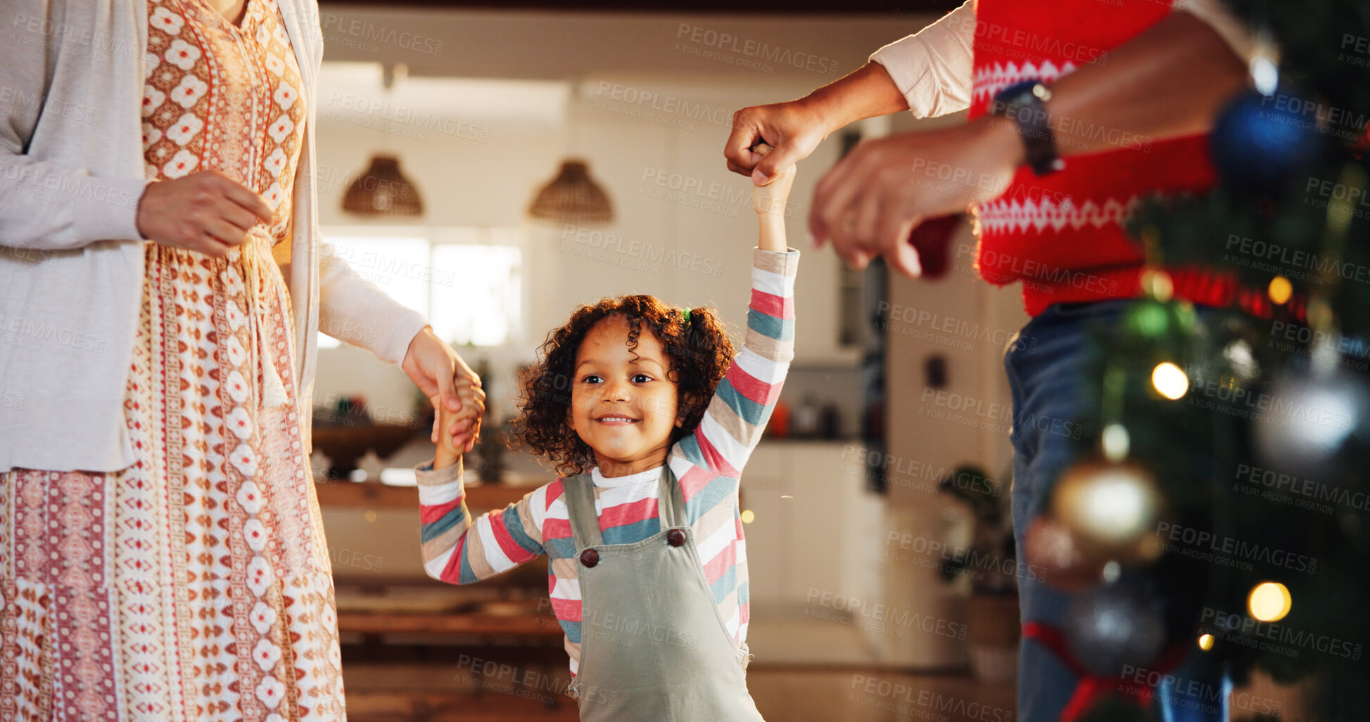 Buy stock photo Christmas, dance and love with family holding hands for festive magic, Noel cheer and xmas celebration. Happy, winter holiday and decorations with people at home for present, vacation or excited