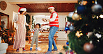 Christmas, dance and support with family holding hands for festive magic, Noel cheer and xmas celebration. Love, winter holiday and decorations with people at home for present, vacation or excited