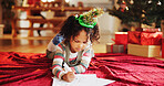 Christmas, drawing and art with child and paper for festive magic, Noel cheer and xmas celebration. Youth, winter holiday and decorations with girl in family home for present, vacation or creative