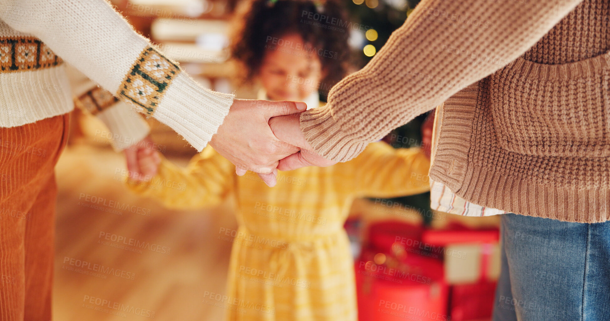 Buy stock photo Christmas, closeup and prayer with family holding hands for festive, worship and xmas celebration. Spirituality, winter holiday and religion with people at home for support, vacation and faith