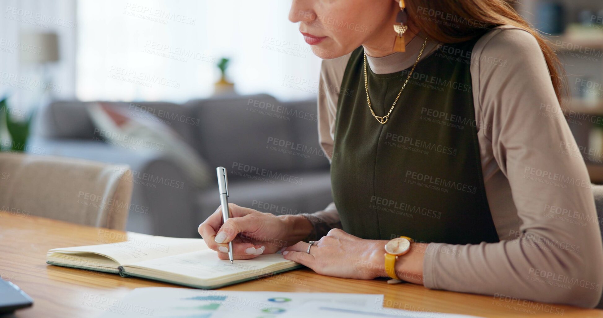 Buy stock photo Business, hands and woman writing in house with financial statistics for company risk management. Remote work, data analyst and research notes for problem solving, budget strategy and finance report