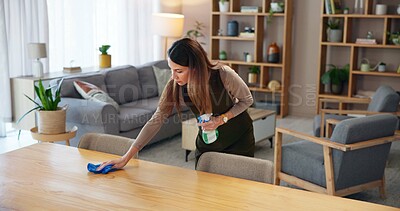 Buy stock photo Cloth, cleaning with woman with bottle in home for housekeeping, hygiene and maintenance on weekend. Surface, bacteria and female person with detergent in house for sanitation, germs and disinfection