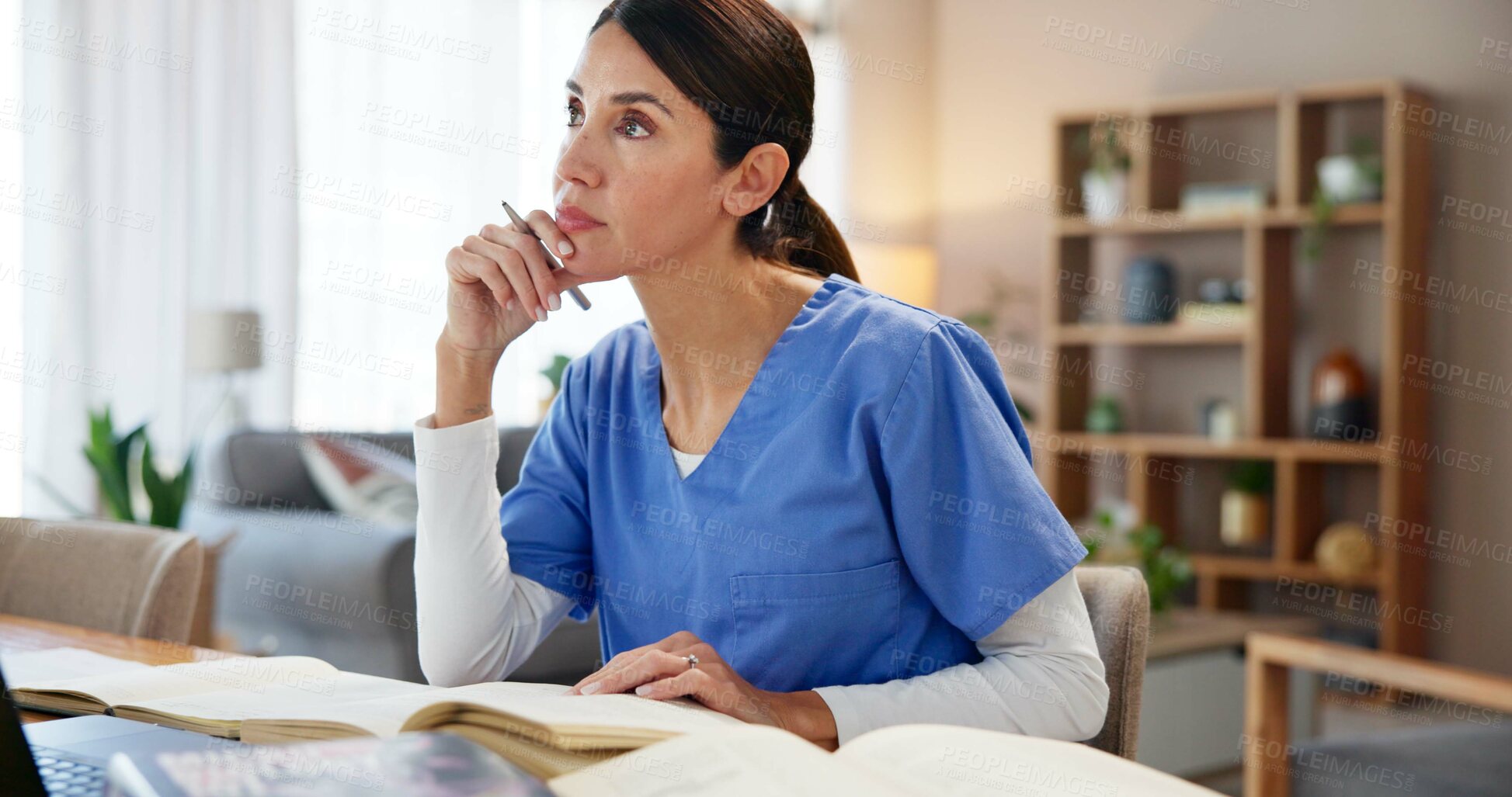 Buy stock photo Nurse, woman and thinking with books at desk for medical research, information and knowledge. Healthcare, worker and planning with idea at home for diagnosis solution, reference and treatment review