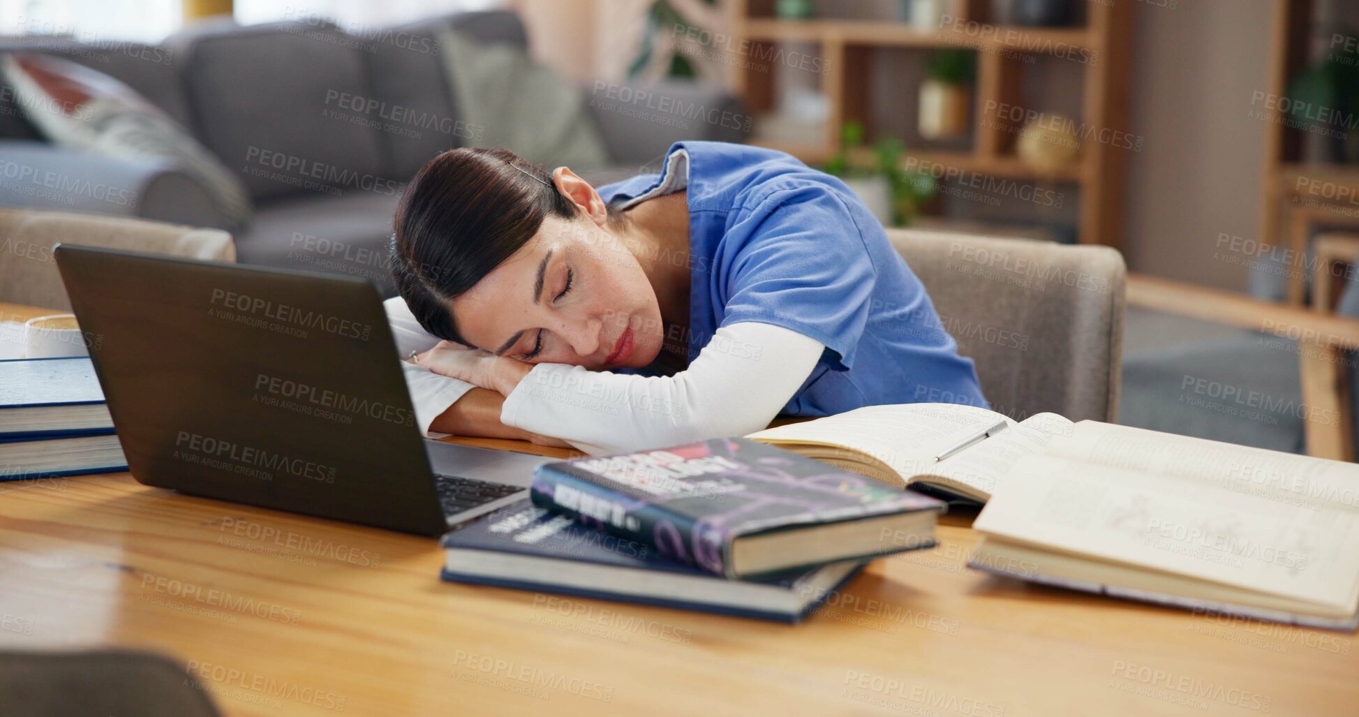 Buy stock photo Nurse, sleeping and tired on table with laptop, burnout and exhausted with medical research. Woman, healthcare student and resting in home with tech, books and fatigue with break for mental health