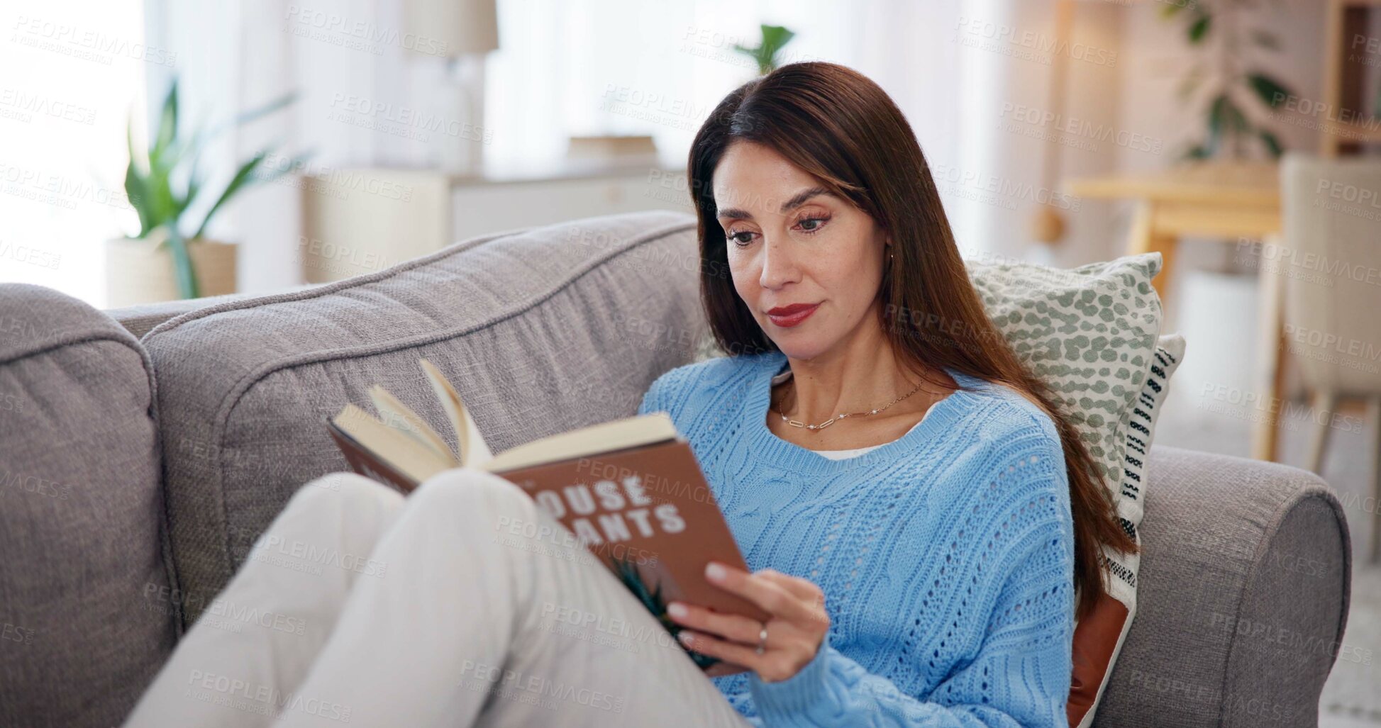 Buy stock photo Relax, reading and woman on sofa with books in home for learning, knowledge and education. Literature, studying and person with novel, story and fantasy for hobby, peace and calm in living room