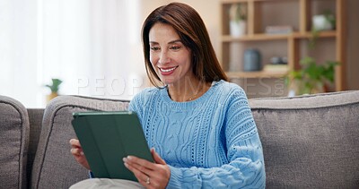 Buy stock photo Woman, happy and relax with tablet on sofa for online communication, network and reading news. Home, smile and female person with technology in living room for website, research or digital connection