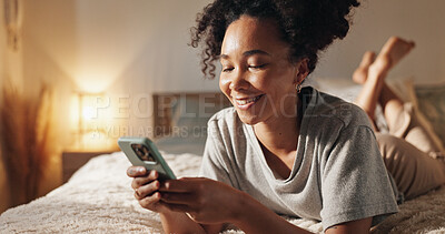 Buy stock photo Woman, chat and phone on bed for social media surfing in home, typing message and notification. Female person, bedroom and online for morning communication, reading ebook and weekend in apartment