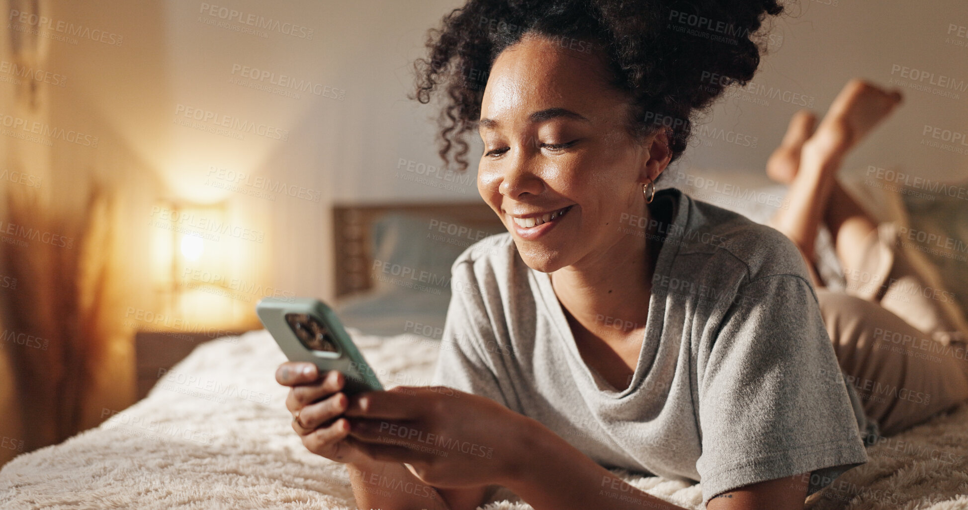 Buy stock photo Woman, chat and phone on bed for social media surfing in home, typing message and notification. Female person, bedroom and online for morning communication, reading ebook and weekend in apartment