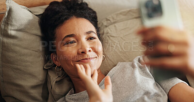 Buy stock photo Woman, waving and phone for video call in home, communication and online for talking in bedroom. Female person, internet connection and virtual conference in bed, comfortable and app for conversation