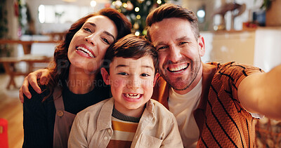 Buy stock photo Family, portrait and selfie in home for Christmas, celebration and social media with holiday and hug. Parents, boy and happy people in living room for memory, profile picture or vacation with embrace