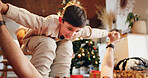 Father, boy and airplane in home for playing, Christmas and bonding with holiday and celebration. Dad, son and happy people in living room for childhood fun, support and vacation with flying as plane