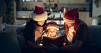 Christmas, bonding and family with book, night and storytelling for festive, reading and child with smile. House, mom and dad with kid, happy and joy for season, man and woman with hat and lounge