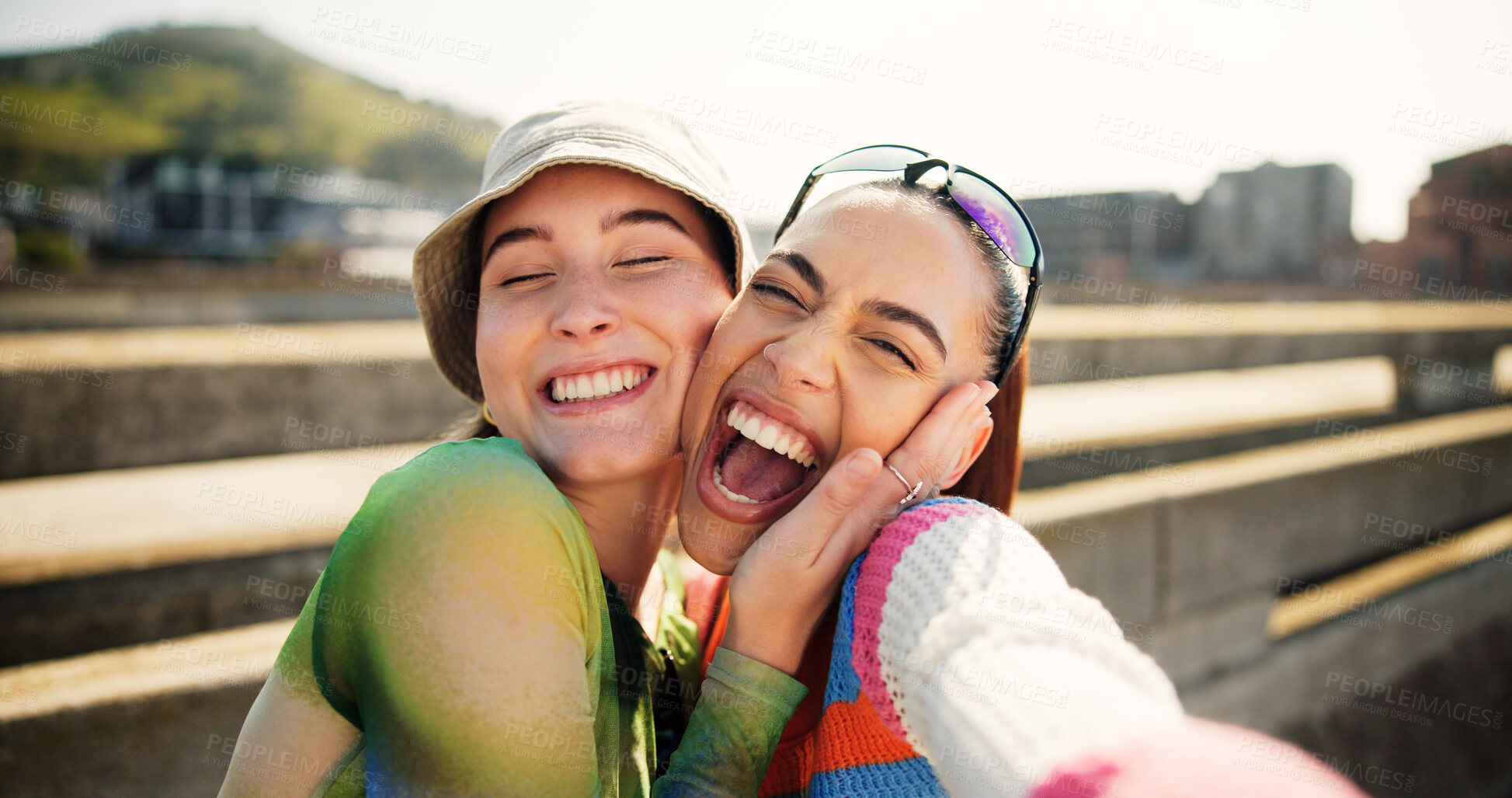 Buy stock photo City, selfie and excited women hug, smile and laugh with cool streetwear on bridge together. Social media, support and happy gen z friends with urban fashion, post and fun bonding in street portrait.