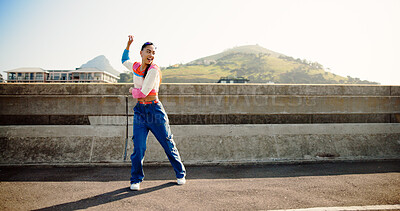 Buy stock photo Woman, dancing and hip hop in city, happy and steps with fashion, style and art on metro bridge. Gen z girl, person and dancer in summer with rhythm, culture and streetwear with smile in Colombia