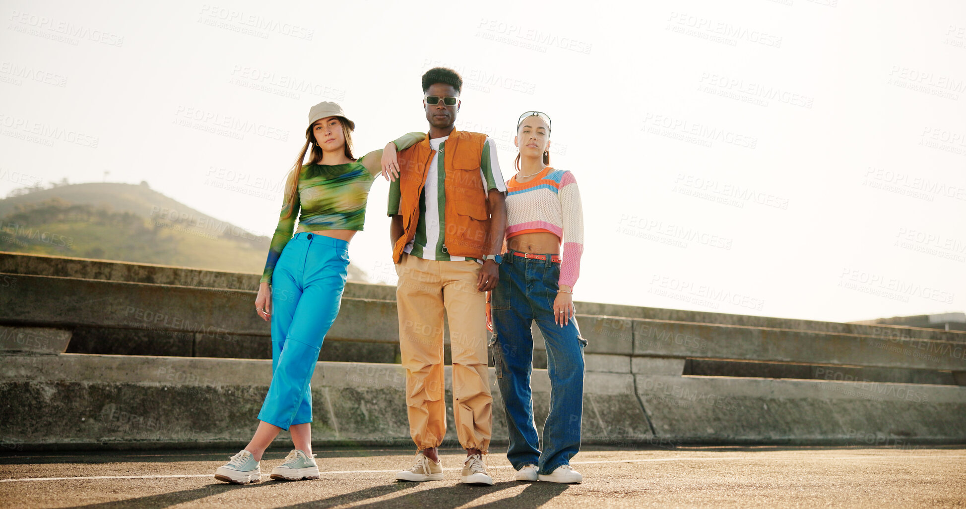 Buy stock photo City, style and group of people with portrait, diversity and cool streetwear on bridge at sunset. Confidence, support and gen z friends with urban fashion, culture and bonding in street together.