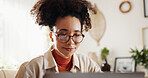 Laptop, glasses and woman at desk in home office with online report, schedule or email. Computer, remote work and consultant reading business plan, article or website for freelance project research