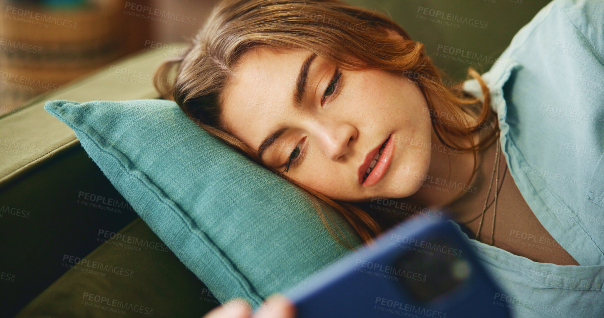 Buy stock photo Tired, woman and relax with phone on couch for communication, social media or reading notification. Bored, girl and mobile with message error, online chat or fatigue for game fail of mistake at house