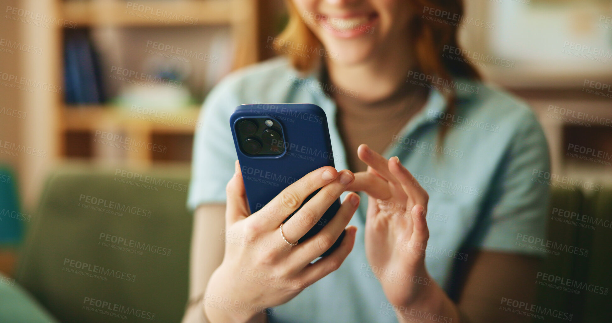 Buy stock photo Hands, woman and smile with phone at house for loan approval, communication and bank application. Happy, girl and reading with mobile for social media, connection and investment update of mortgage