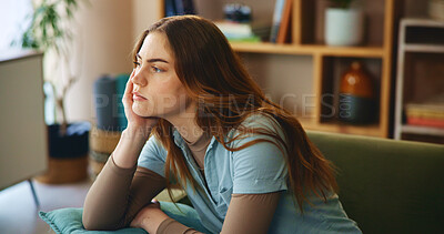 Buy stock photo House, thinking and woman on sofa, stress and decision with depression, anxiety and mental health. Apartment, person and girl on couch, lonely and sad with planning, choice and confused with doubt