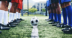 Legs, match and group with ball, field and formation of team, soccer and fitness with games. Outdoor, playing and feet for football, training and practice for competition, healthy and people in sport