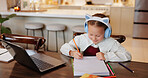 Laptop, writing and education with child in kitchen for online class, streaming and school. Elearning, knowledge and technology with girl in family home for academic tutor, growth and studying
