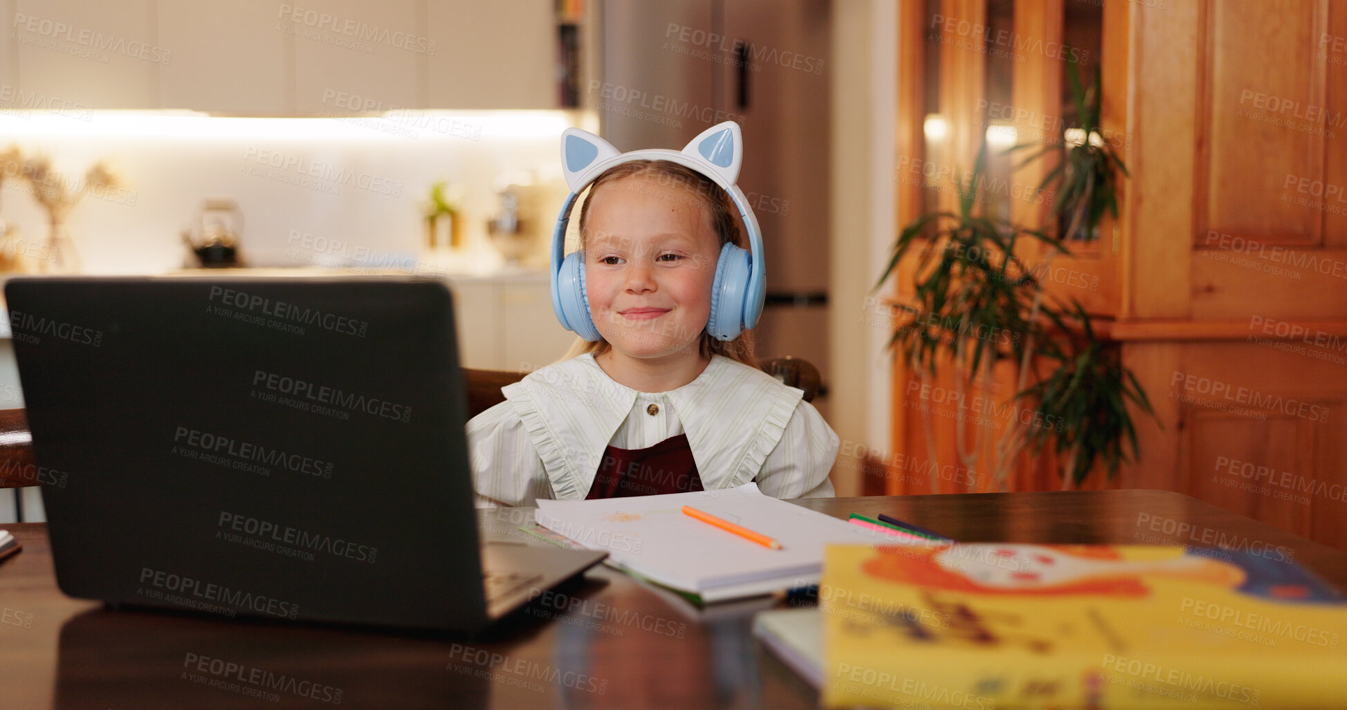 Buy stock photo Laptop, headphones and studying with child for online class, student and school in kitchen. Elearning, knowledge and technology with girl in family home for academic tutor, growth and education