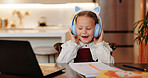 Laptop, headphones and education with child in kitchen for online class, streaming and school. Elearning, knowledge and technology with girl in family home for academic tutor, growth and studying