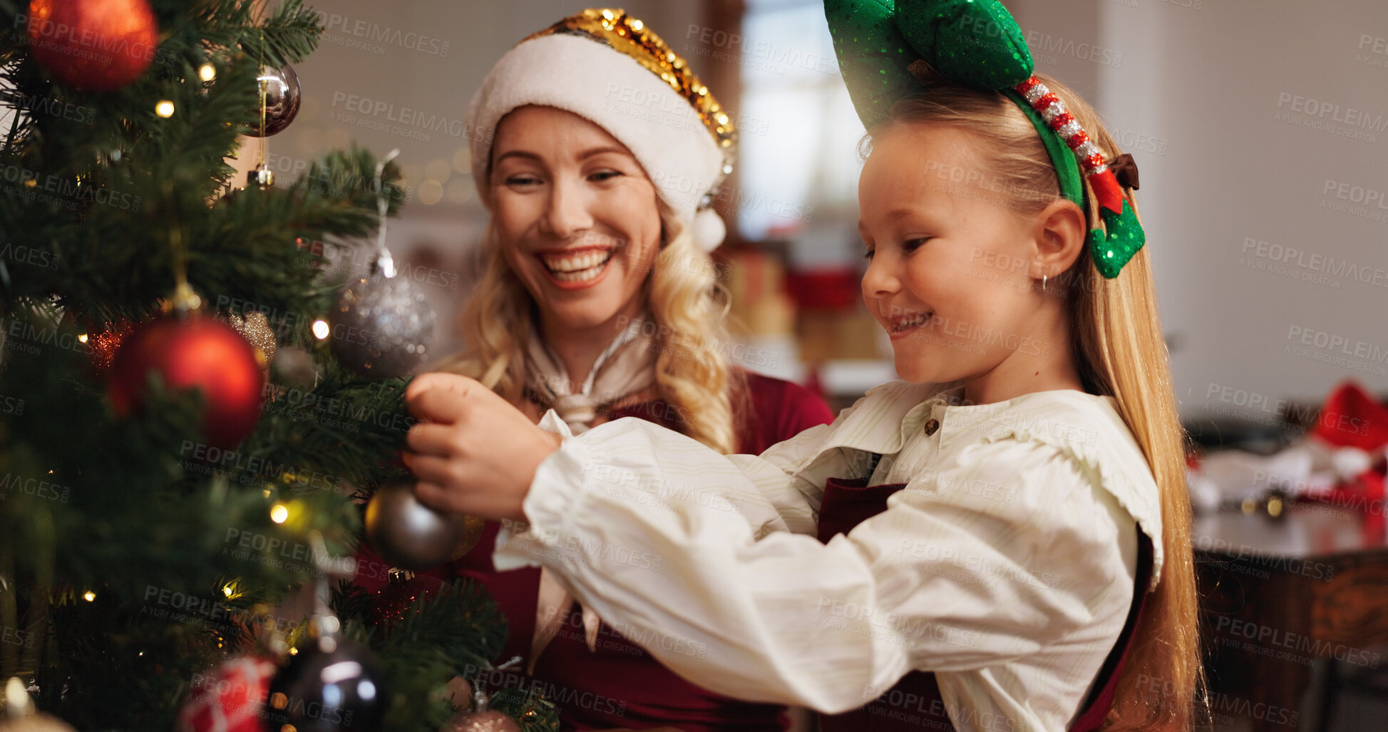 Buy stock photo Christmas, smile and tree with mother and daughter for decoration, gift giving and festive season. Xmas, holiday and celebration with woman and child in family home for tradition, noel and winter