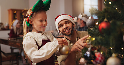 Buy stock photo Christmas, bauble and tree with father and daughter for decoration, gift giving and festive season. Xmas, holiday and celebration with man and child in family home for tradition, noel and winter