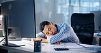 Computer, deadline and sleeping with business man in office at night for overtime administration. Burnout, exhaustion and fatigue with tired employee at desk in workplace for late evening report