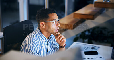 Buy stock photo Thinking, night and online with business man in office for profit margin report, client review and advisory. Research, stakeholder proposal or reading with person for investment portfolio and glasses