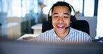 Call center, smile and man with headphones, computer and internet with friendly service. Person, consultant and employee with pc, headset and customer support with telemarketing and communication