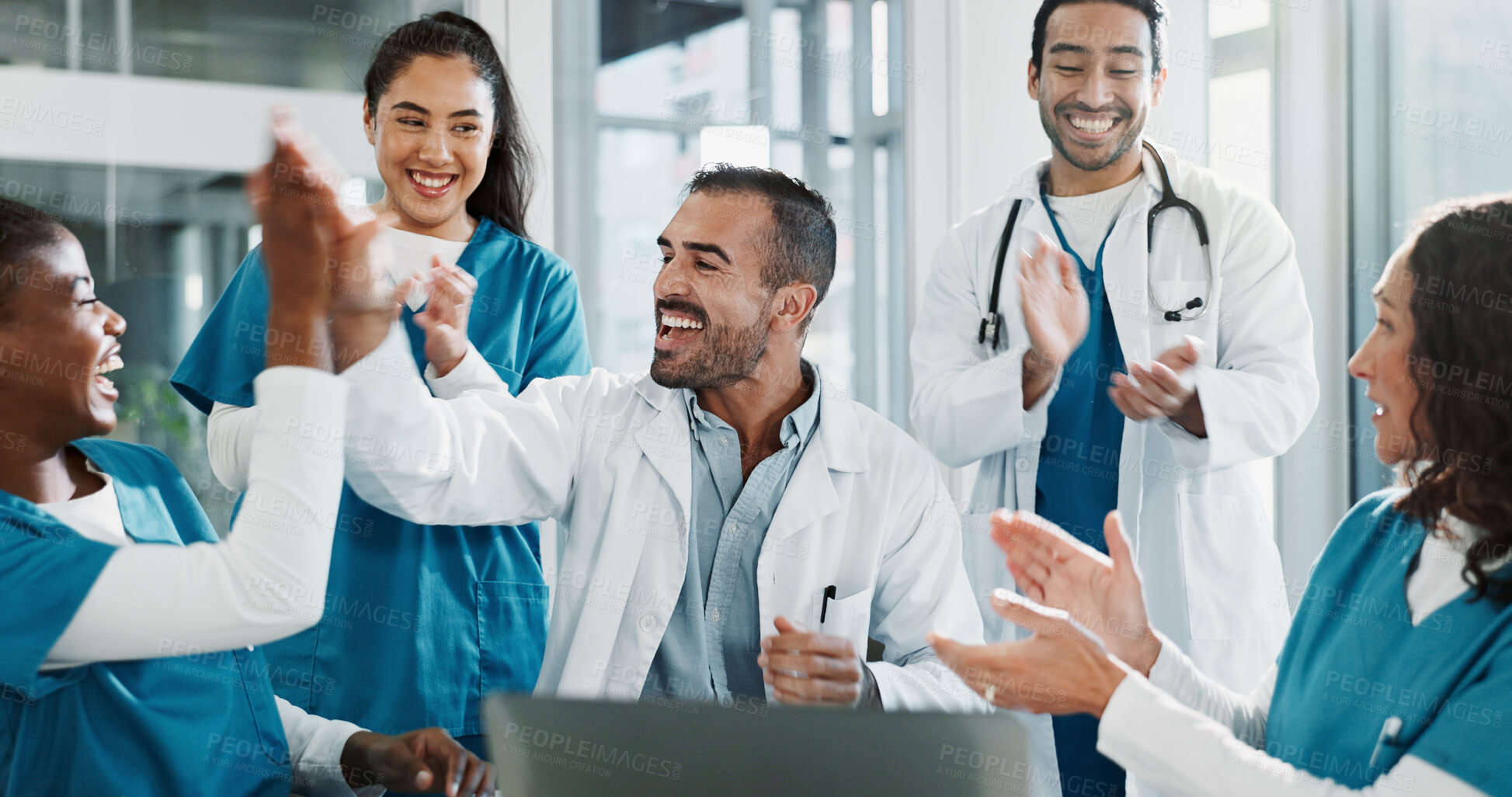 Buy stock photo Team, doctor and laptop with applause in hospital for medical success, celebration and promotion news. Happy, people and clapping with online email, healthcare winner and  congratulations for funding