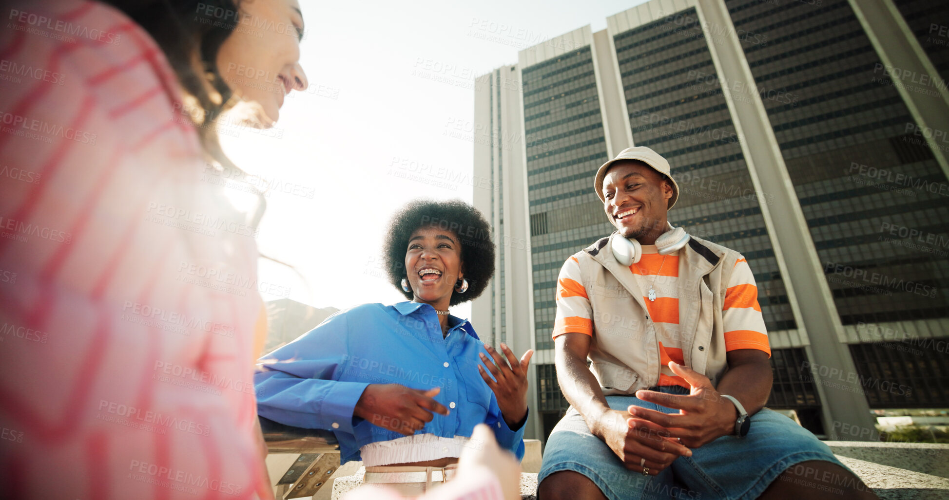 Buy stock photo Outdoor, friends and laughing with conversation in city with joke, bonding and fun on campus as university students. People, fashion and happy or smile with street style, swag and edgy as gen z