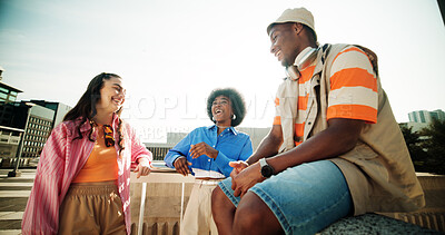 Buy stock photo Outdoor, friends and happy with conversation in city with joke, bonding and fun on campus as university students. People, fashion and smile or laughing with street style, swag and edgy as gen z