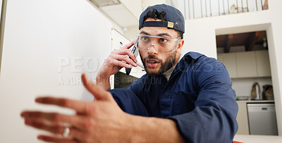 Buy stock photo Plumber, worker and man with phone call in kitchen for pipeline problem, leakage repair and sink maintenance. Plumbing contractor, handyman and contact owner for filter system installation in home